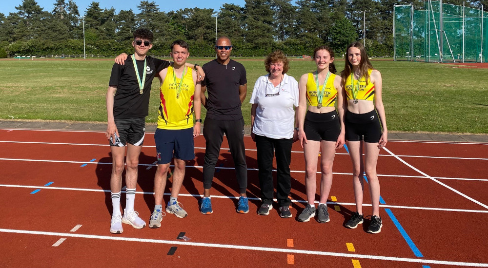 Dierdre Elmhirst with athletes during the county championships