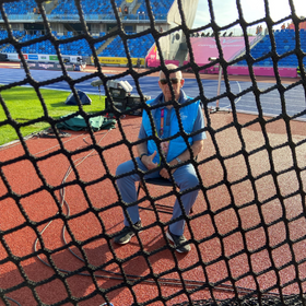 officials outside throws cage at Commonwealth Games 2022
